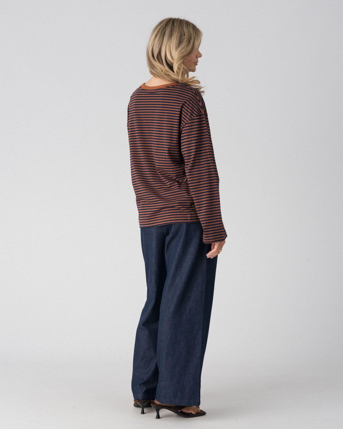 Lenelly Lena oversized striped nursing tee in brown and navy, angled back view showing the drop shoulder