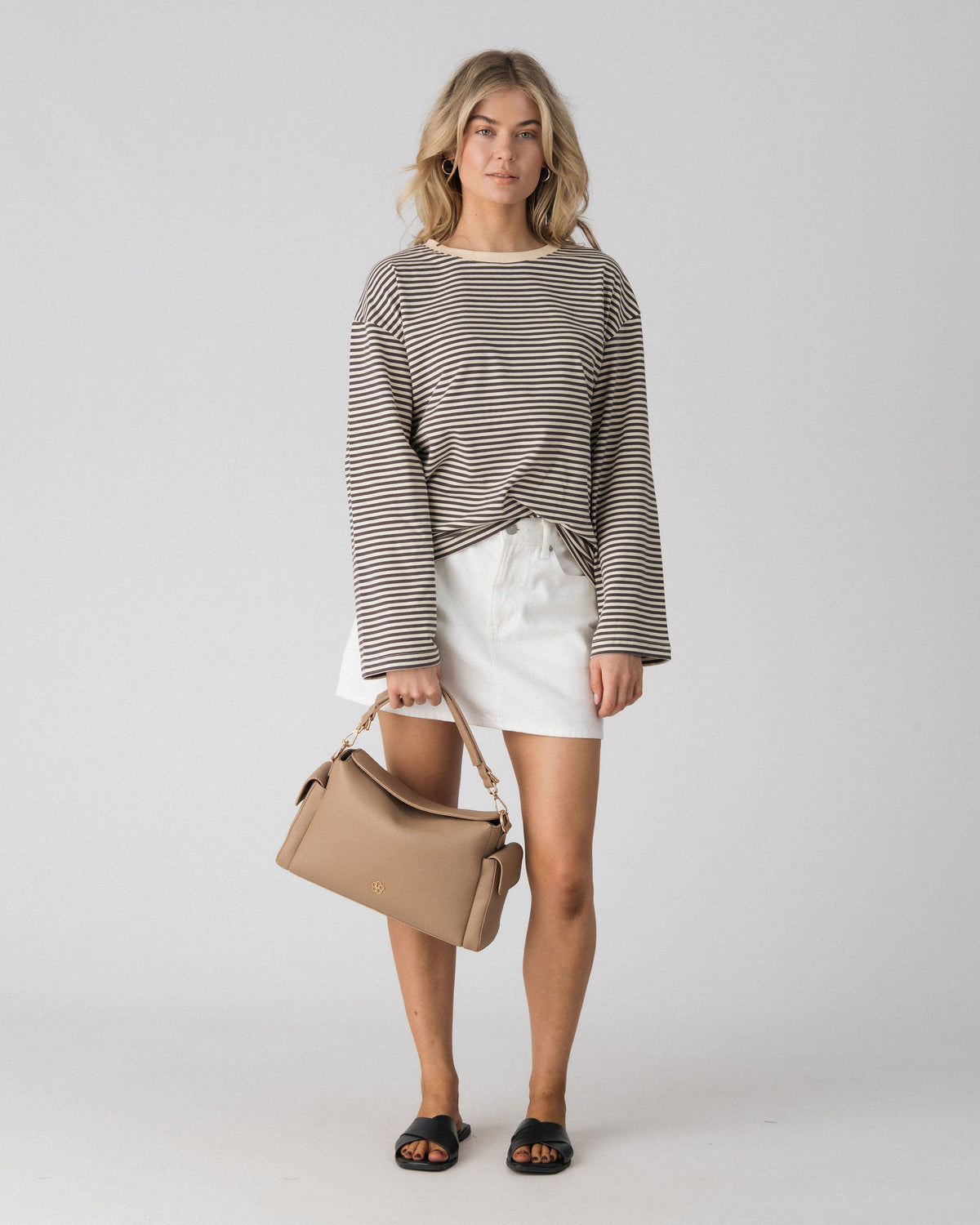 Lenelly Lena striped nursing tee in grey and off-white worn with the Lenelly Hera pram caddy bag in latte