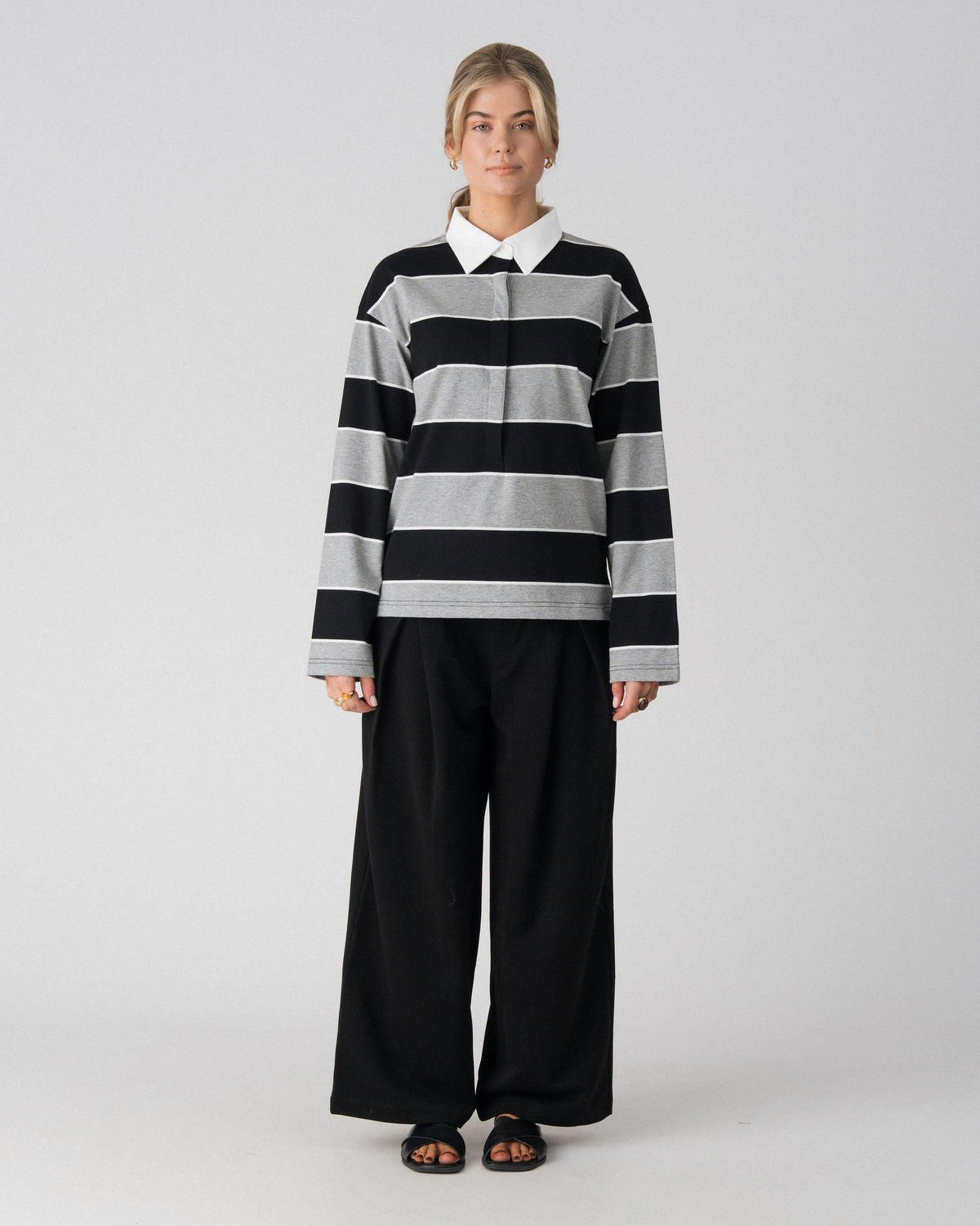 Lenelly Erika rugby nursing polo in black and grey stripe with a white collar, a breastfeeding-friendly long sleeve polo, front view