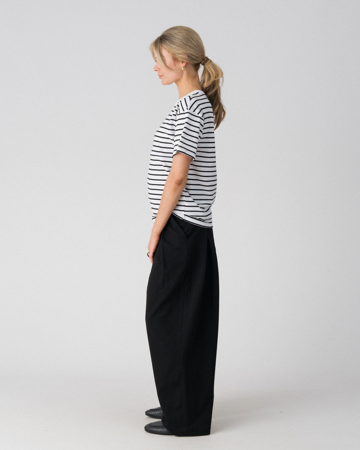 Lenelly Issa everyday striped nursing tee in white and black, side view showing the relaxed everyday fit