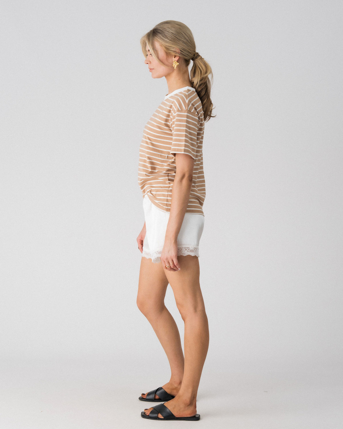 Lenelly Issa striped tee in tan and white, side view showing the relaxed everyday fit