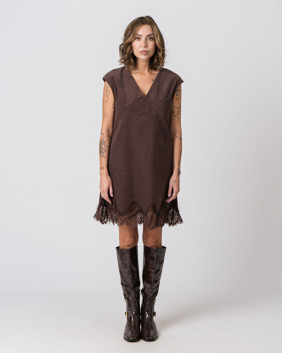Lenelly Audrey corduroy dress in chocolate brown, a cap sleeve breastfeeding-friendly dress with lace trim hem, front view on a white background