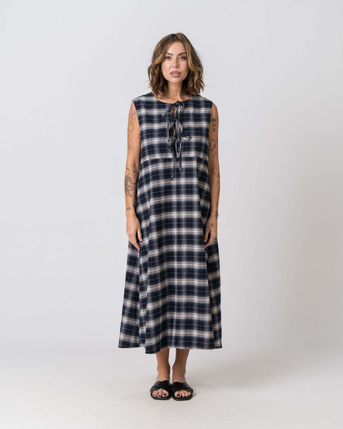 Lenelly Bridget reversible flannel dress worn on the reverse side, showing the bow-tie front detail, on a white background