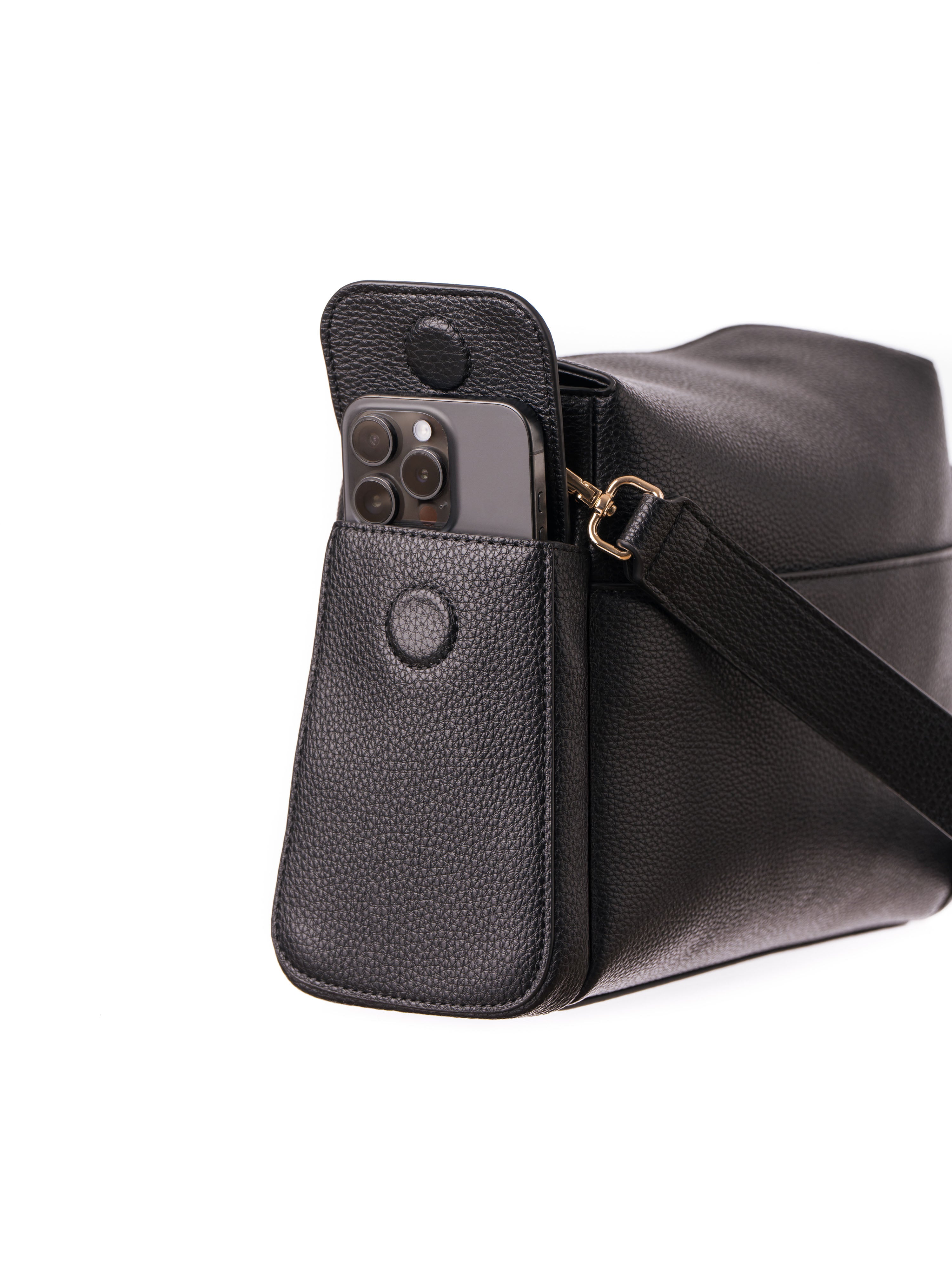 Lenelly Hera pram caddy bag in black vegan leather with adjustable strap, side view on white background with a phone in the side pocket