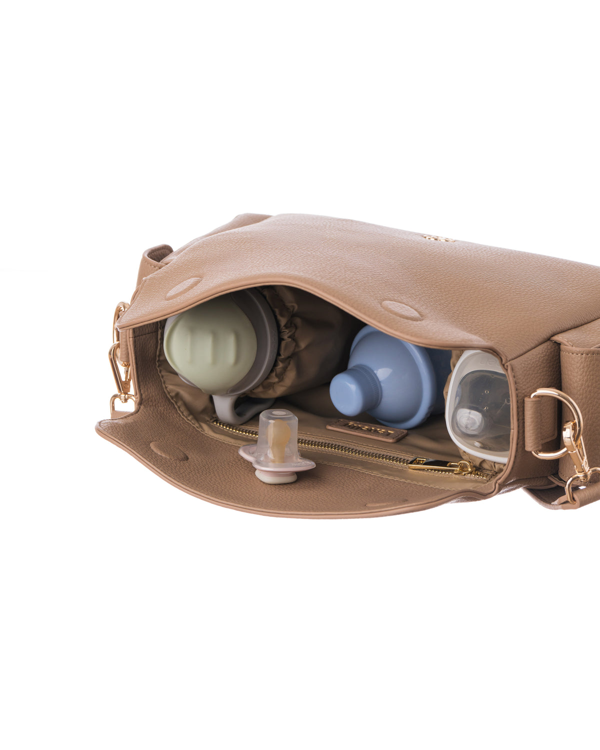 Lenelly Hera pram caddy bag in sand vegan leather with adjustable strap, styled interior view on white background with baby bottle, formula container, water sippy cup and dummy pacifier