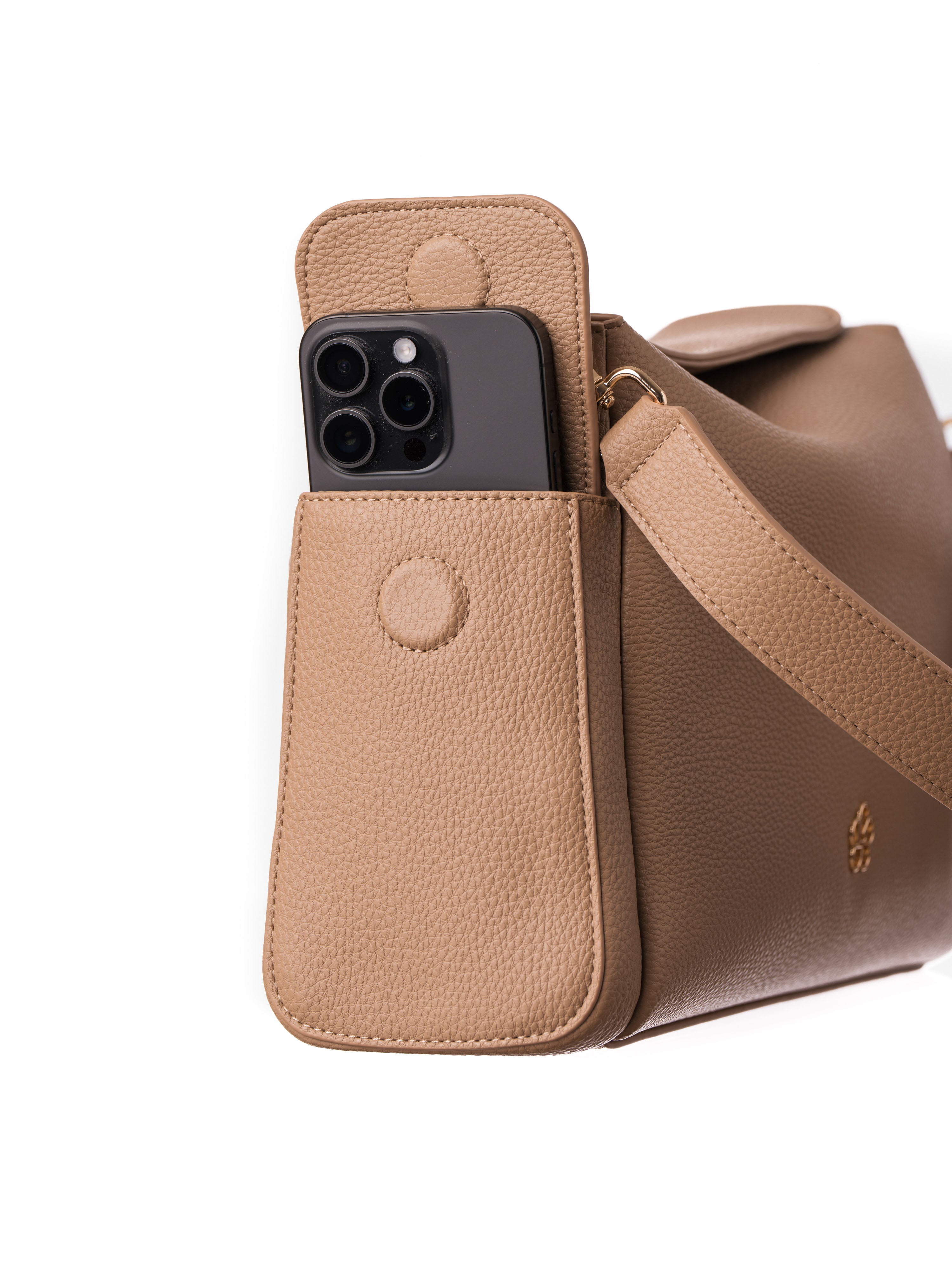 Lenelly Hera pram caddy bag in sand vegan leather with adjustable strap, side view on white background with phone in side pocket