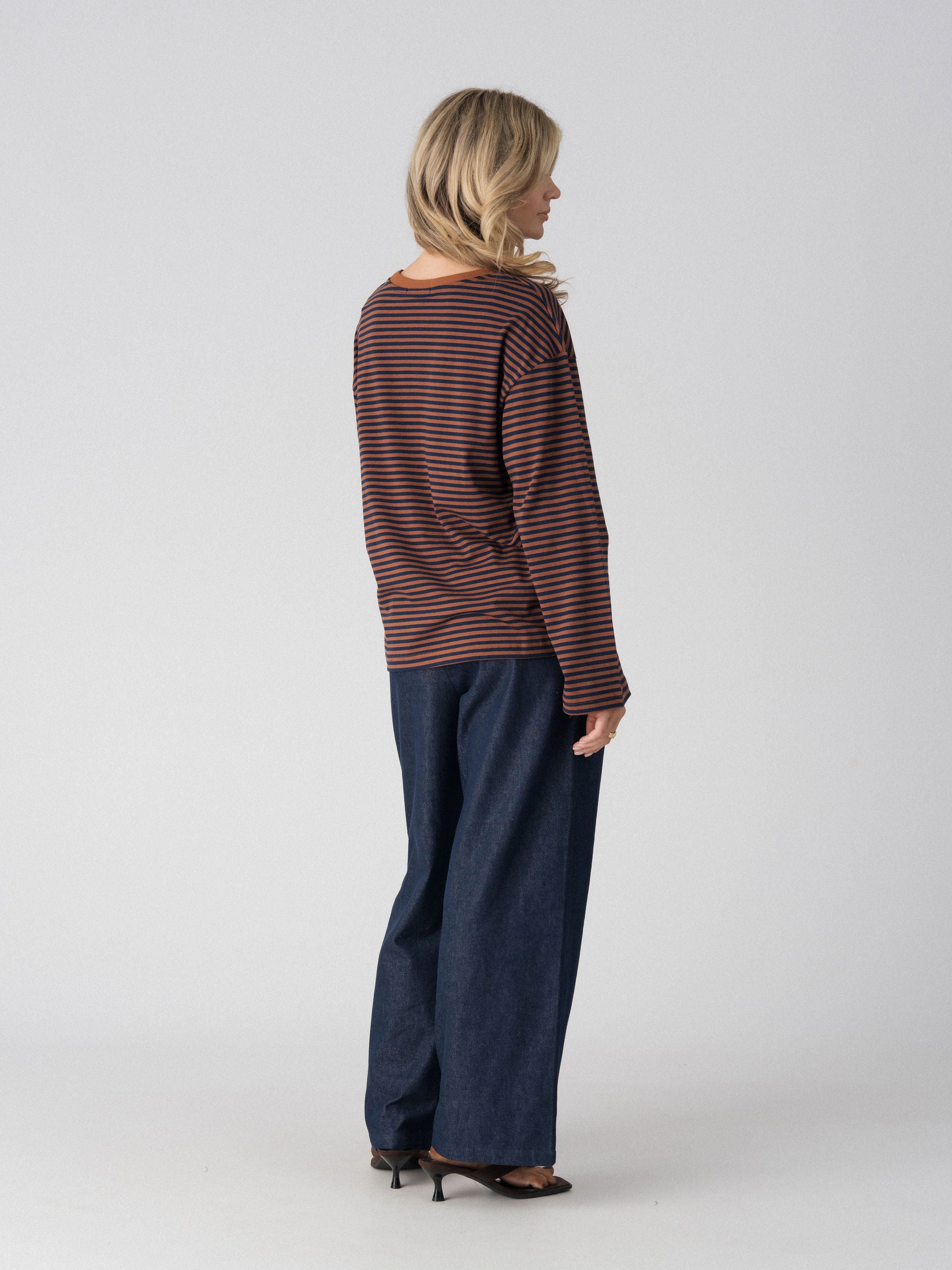 Lenelly Lena oversized striped nursing tee in brown and navy, angled back view showing the drop shoulder