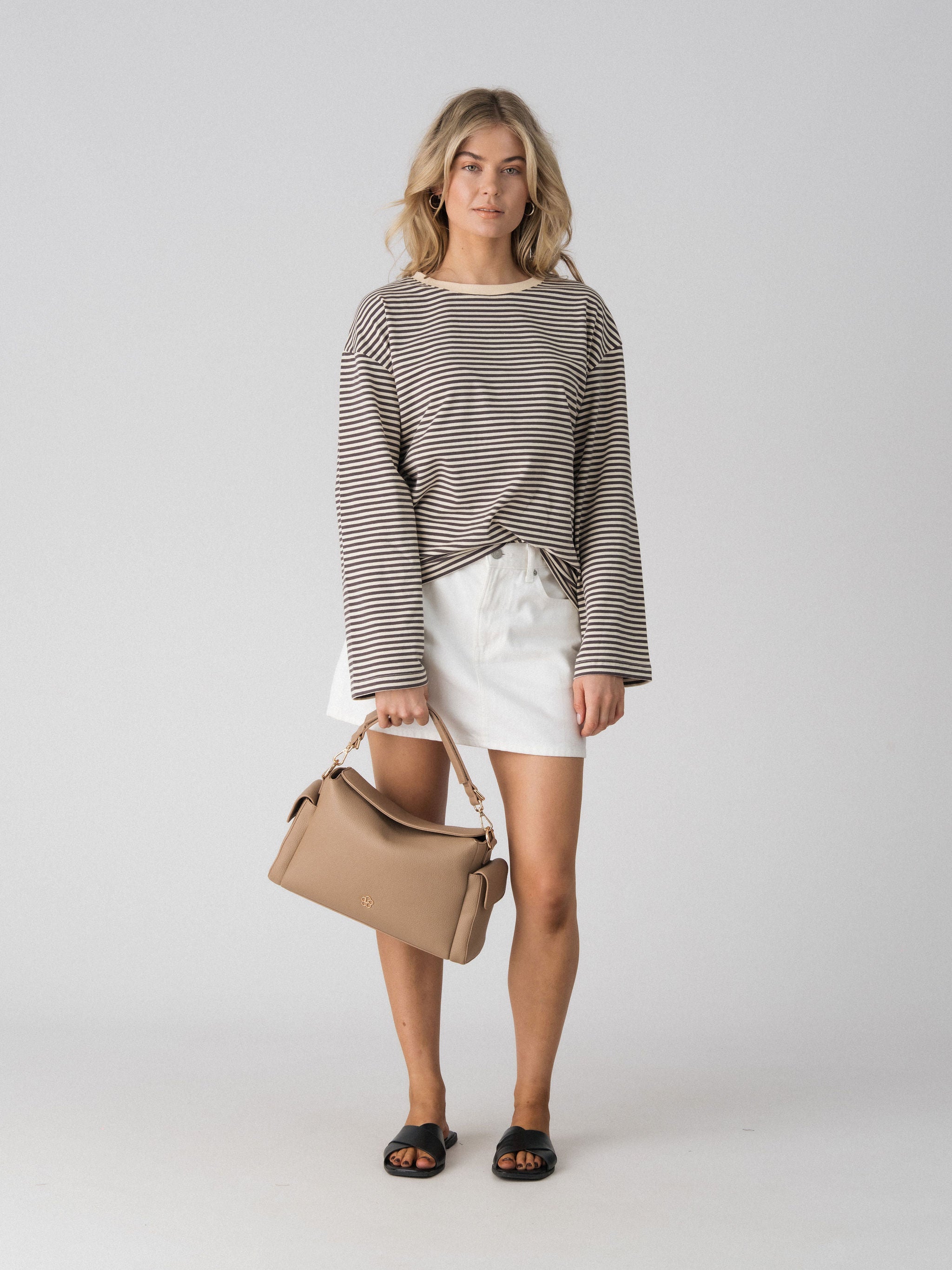 Lenelly Lena striped nursing tee in grey and off-white worn with the Lenelly Hera pram caddy bag in latte