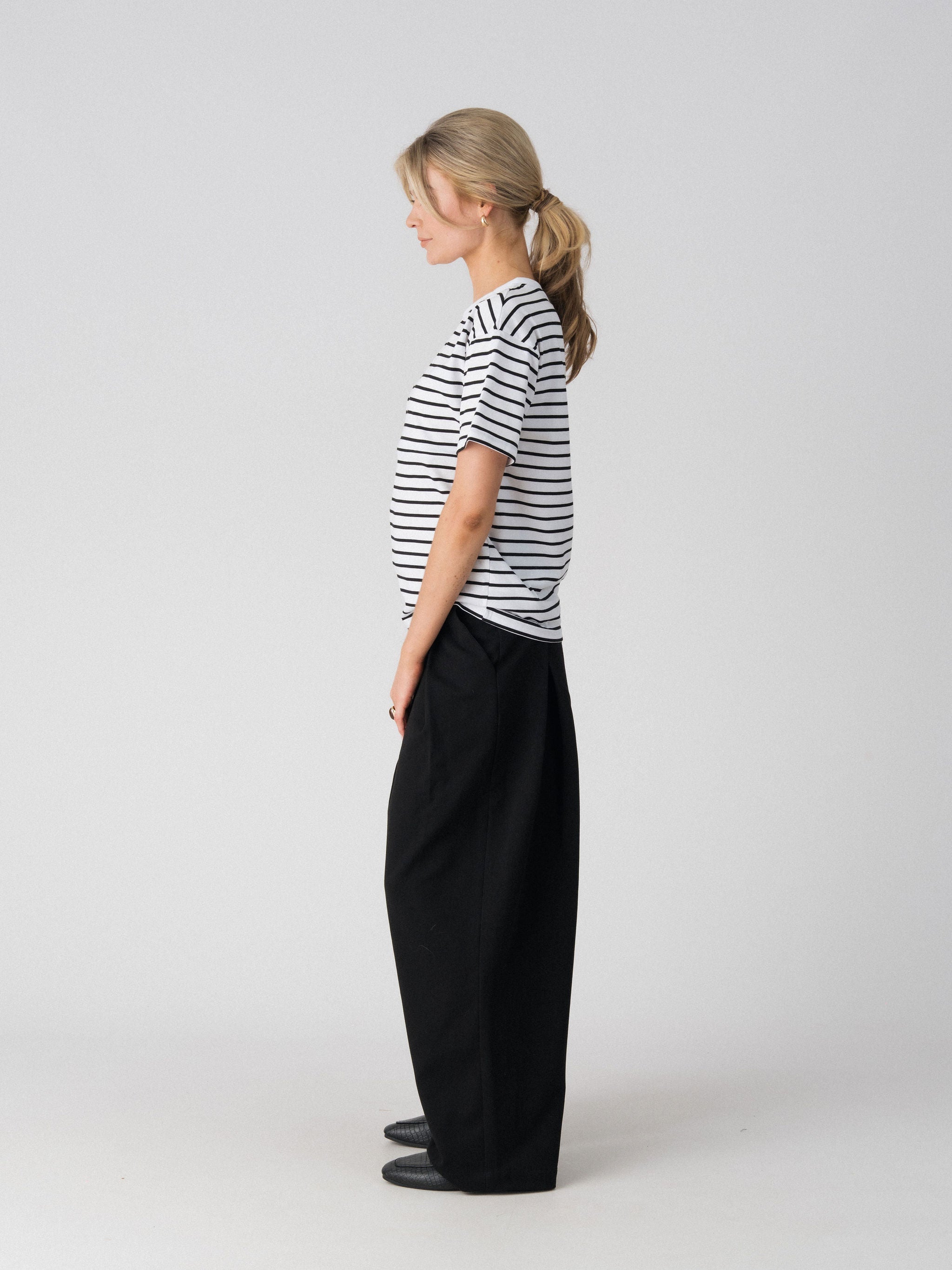 Lenelly Issa everyday striped nursing tee in white and black, side view showing the relaxed everyday fit