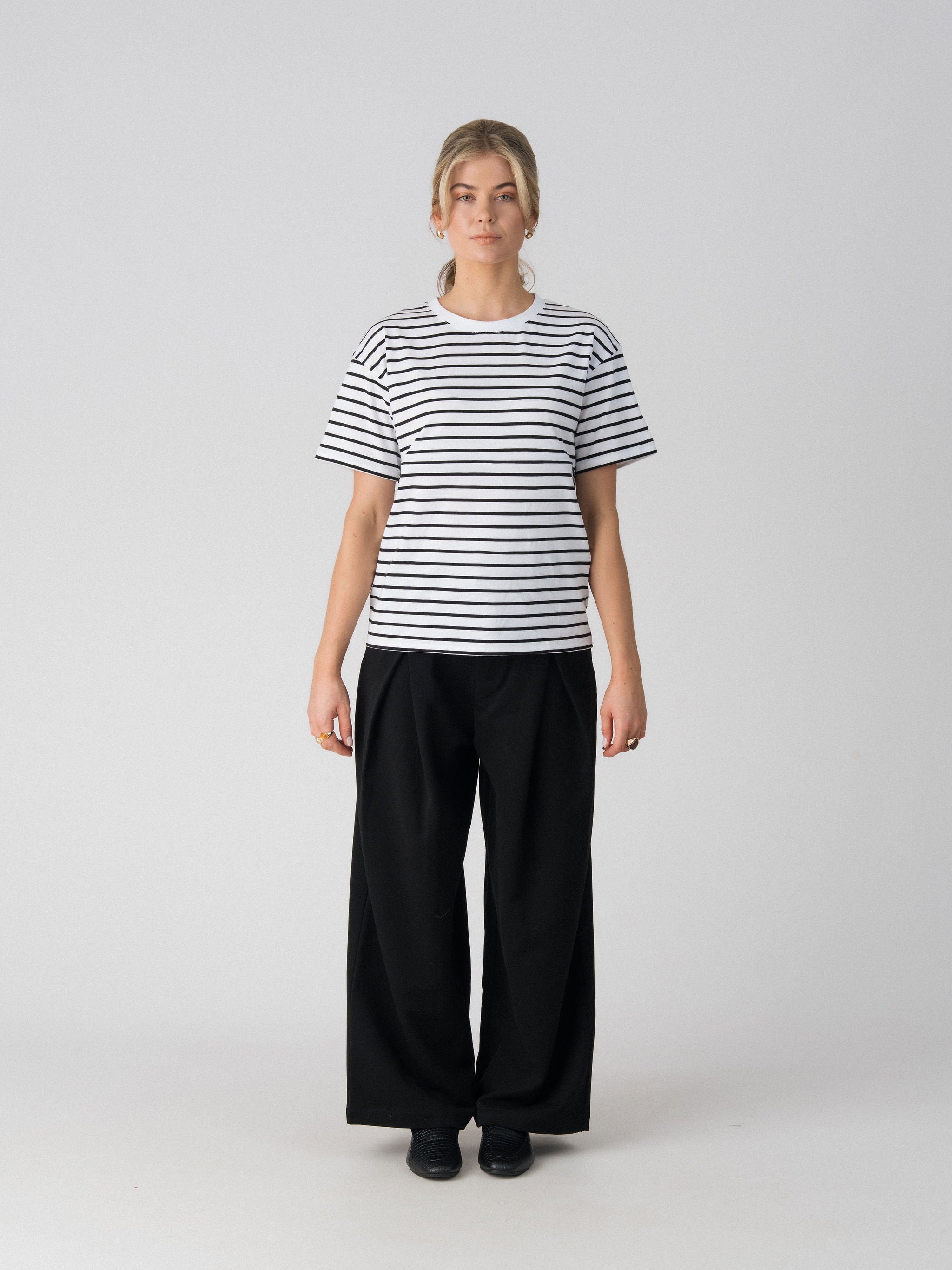Lenelly Issa everyday striped tee in white and black, a breastfeeding-friendly cotton tee, front view on a light studio background