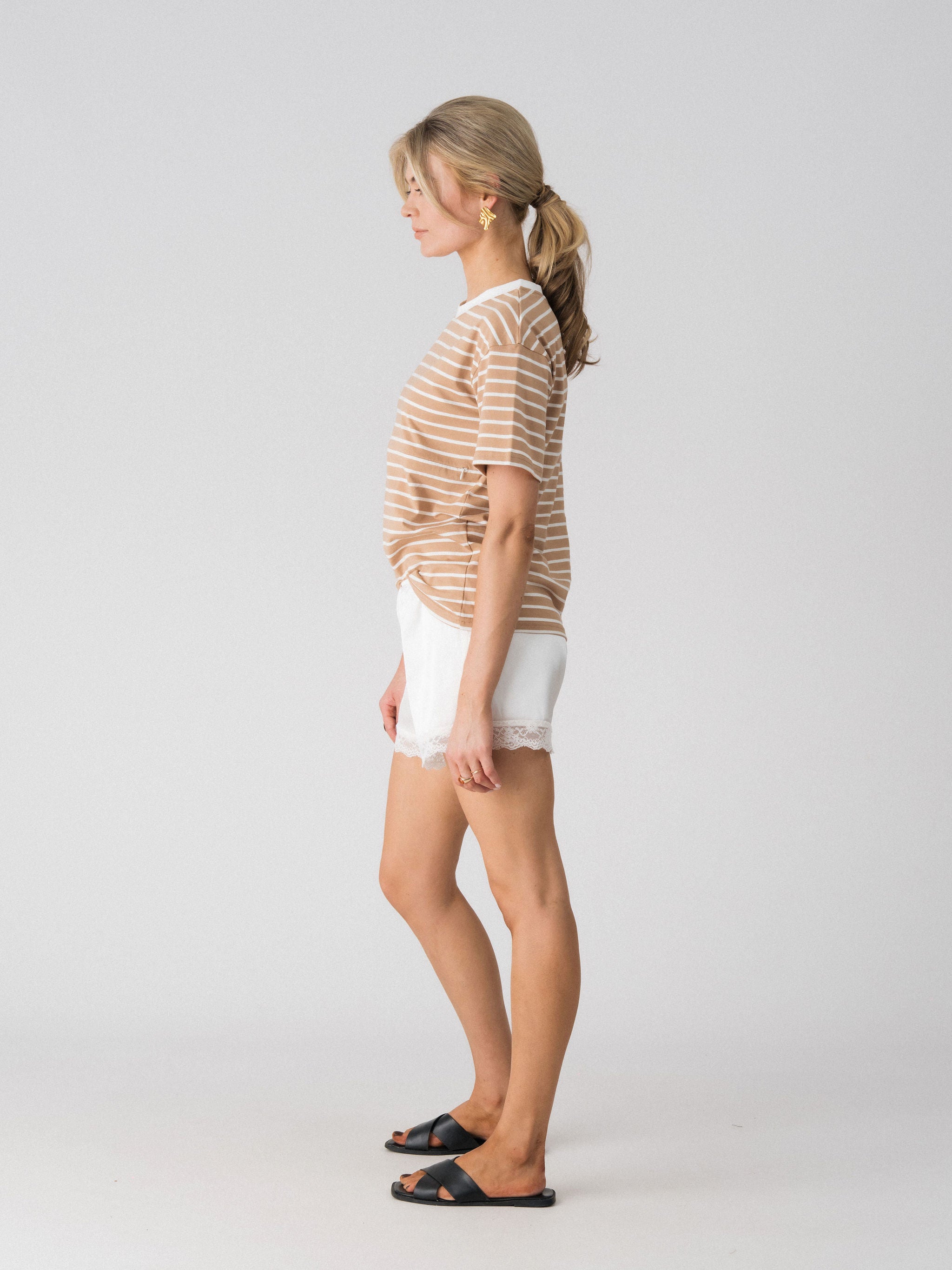Lenelly Issa striped tee in tan and white, side view showing the relaxed everyday fit