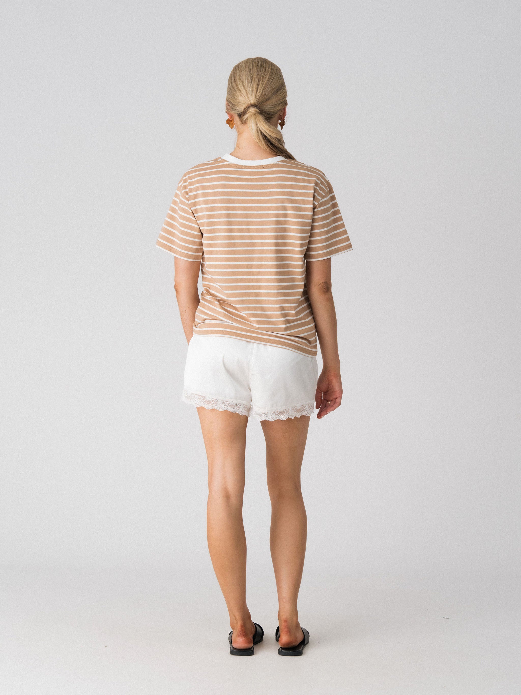 Back view of the Lenelly Issa everyday striped nursing tee in tan and white