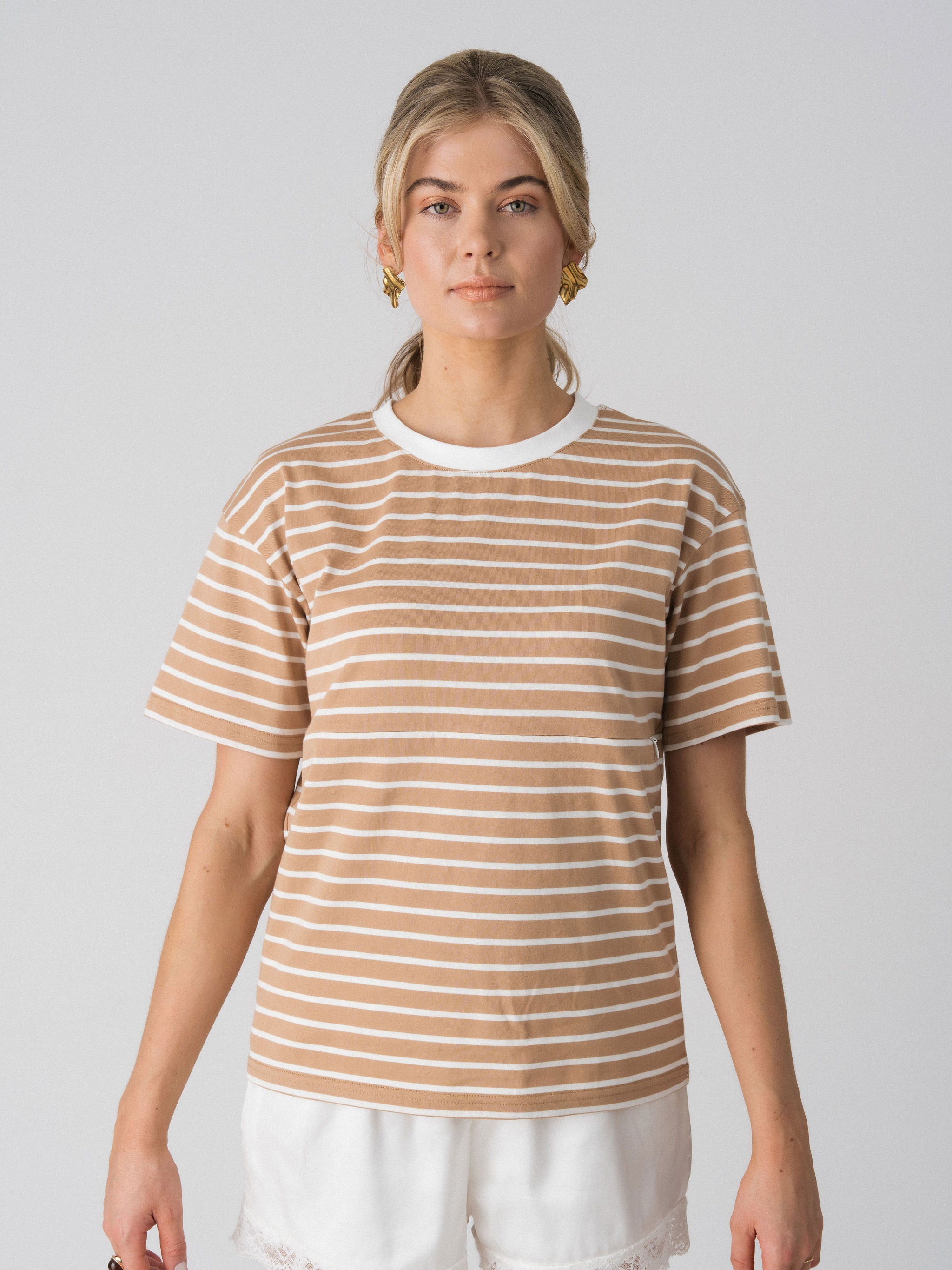 Close-up of the Lenelly Issa nursing tee in tan and white stripe, showing the hidden underbust zip concealed within the stripe