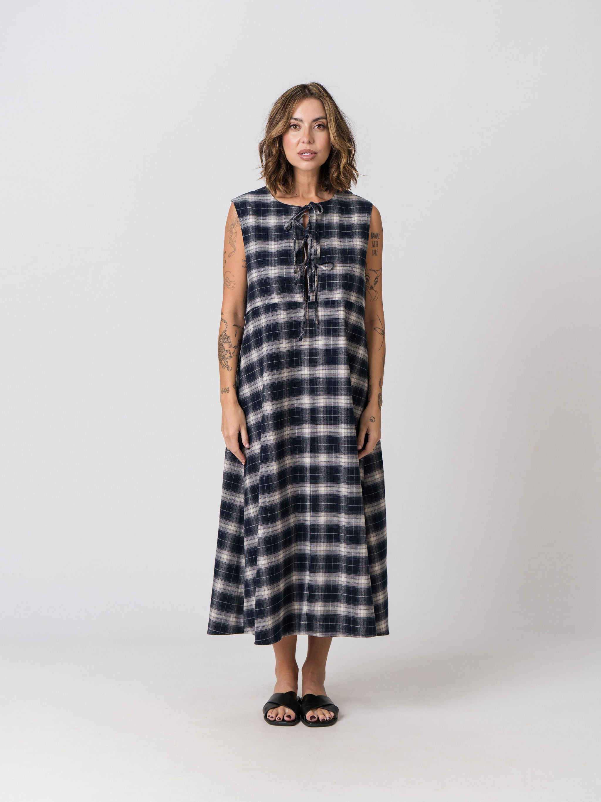 Lenelly Bridget reversible flannel dress worn on the reverse side, showing the bow-tie front detail, on a white background