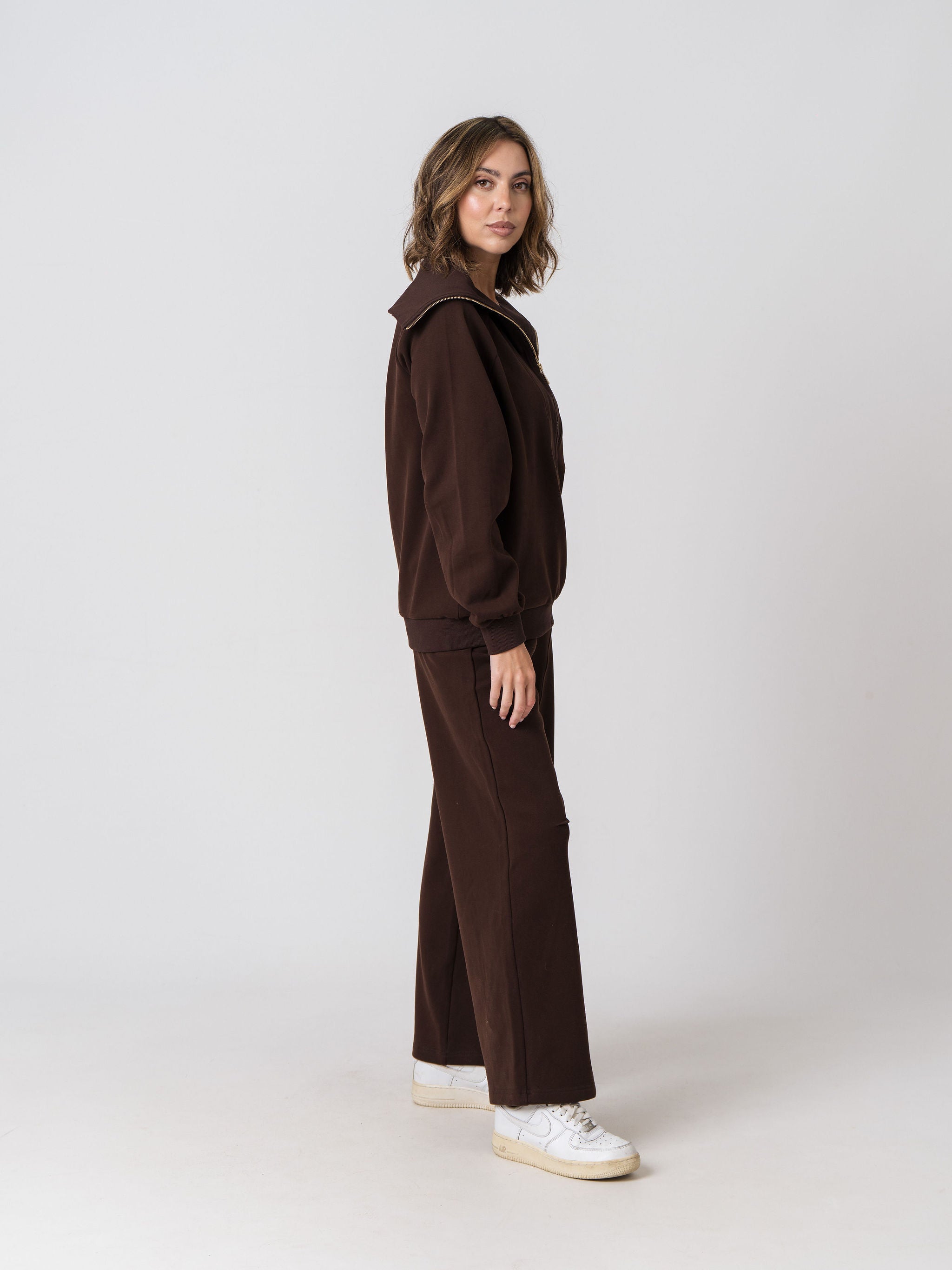 Lenelly Mish half zip nursing sweatshirt and matching sweatpants in chocolate, side view on a light studio background