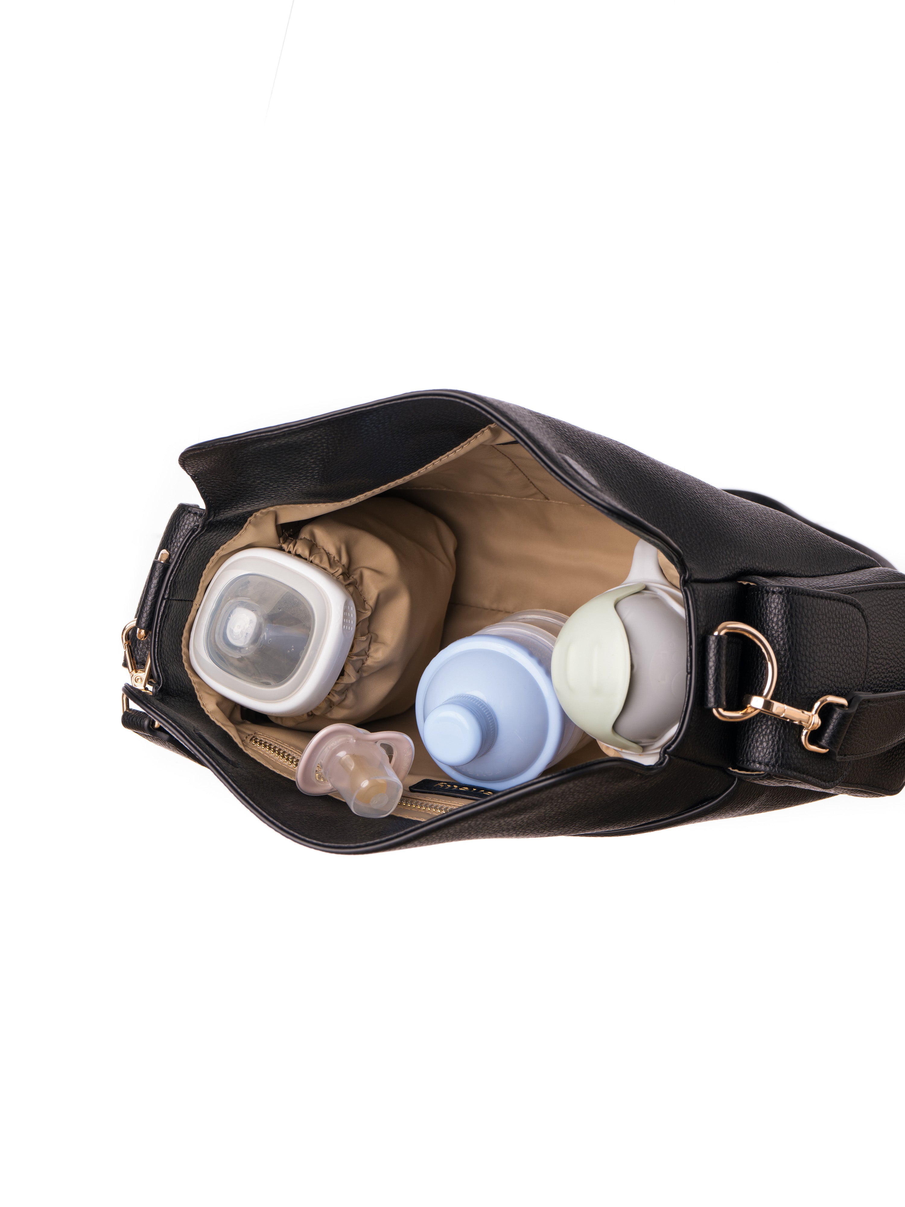 Lenelly Hera pram caddy bag in black vegan leather with adjustable strap, interior view on white background with baby bottles, formula container, water sippy cup and dummy pacifier inside the bag